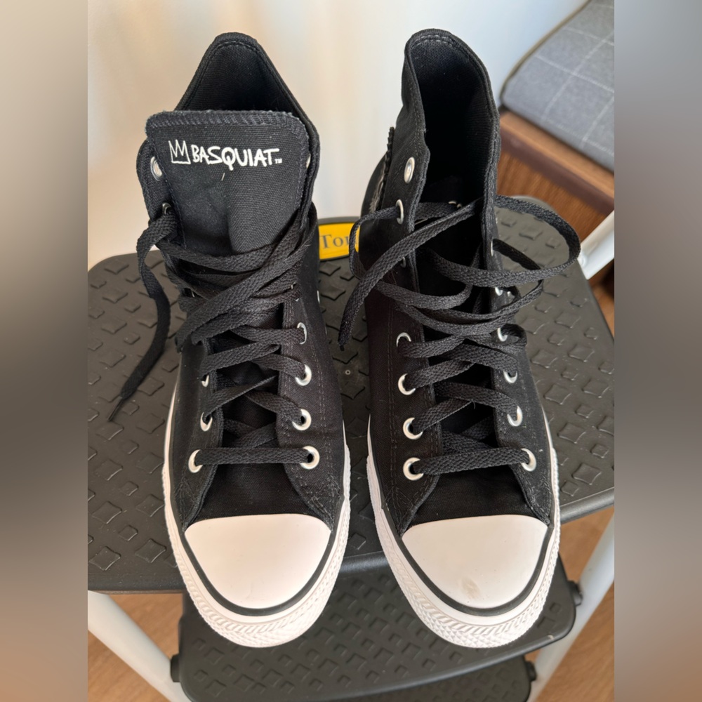 Black canvas Basquiat All Stars high tops.